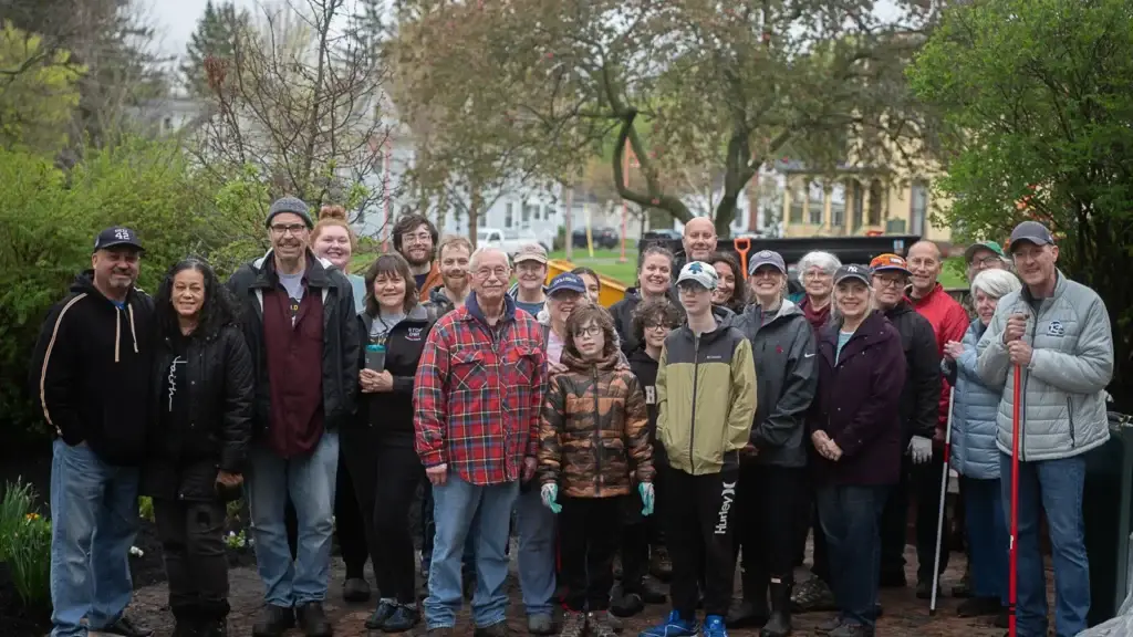 RAID and STOP-DWI Monroe County volunteers gather for a group portrait at the memorial garden